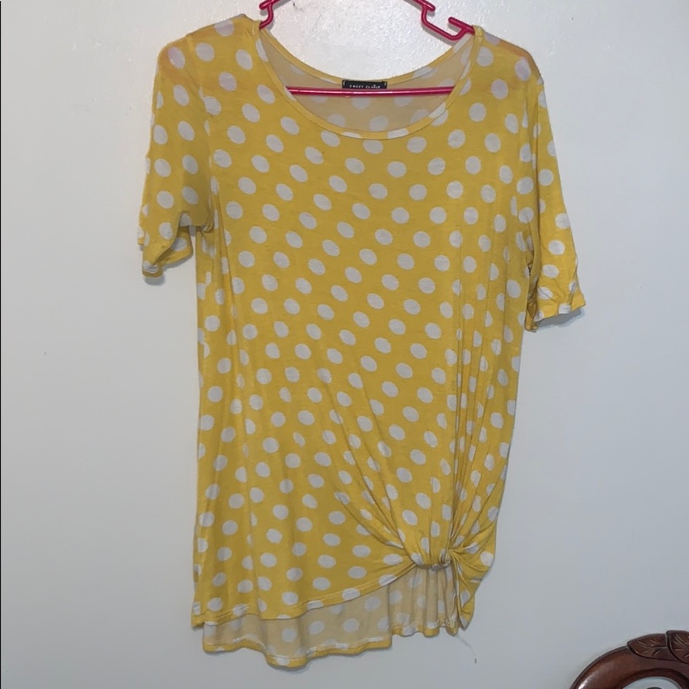 Yellow Polka dot shirt.